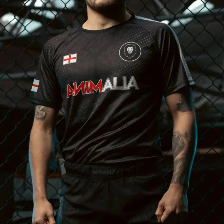 Man wearing black England flag athletic tee for MMA training